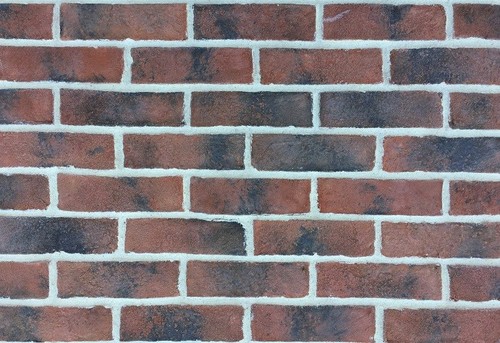 Weathered red brick slip - weathered,